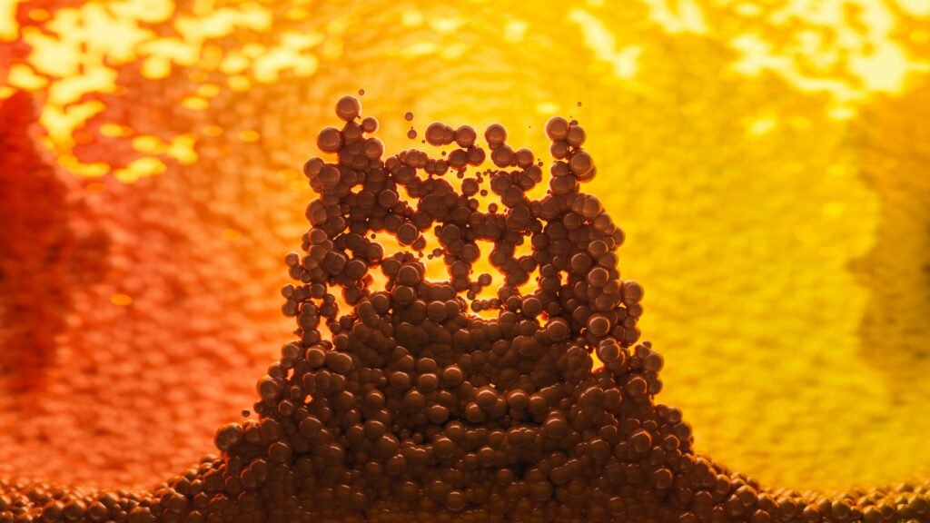 Dynamic abstract 3D render featuring molecules with vibrant yellow and orange colors, suggesting energy and motion.